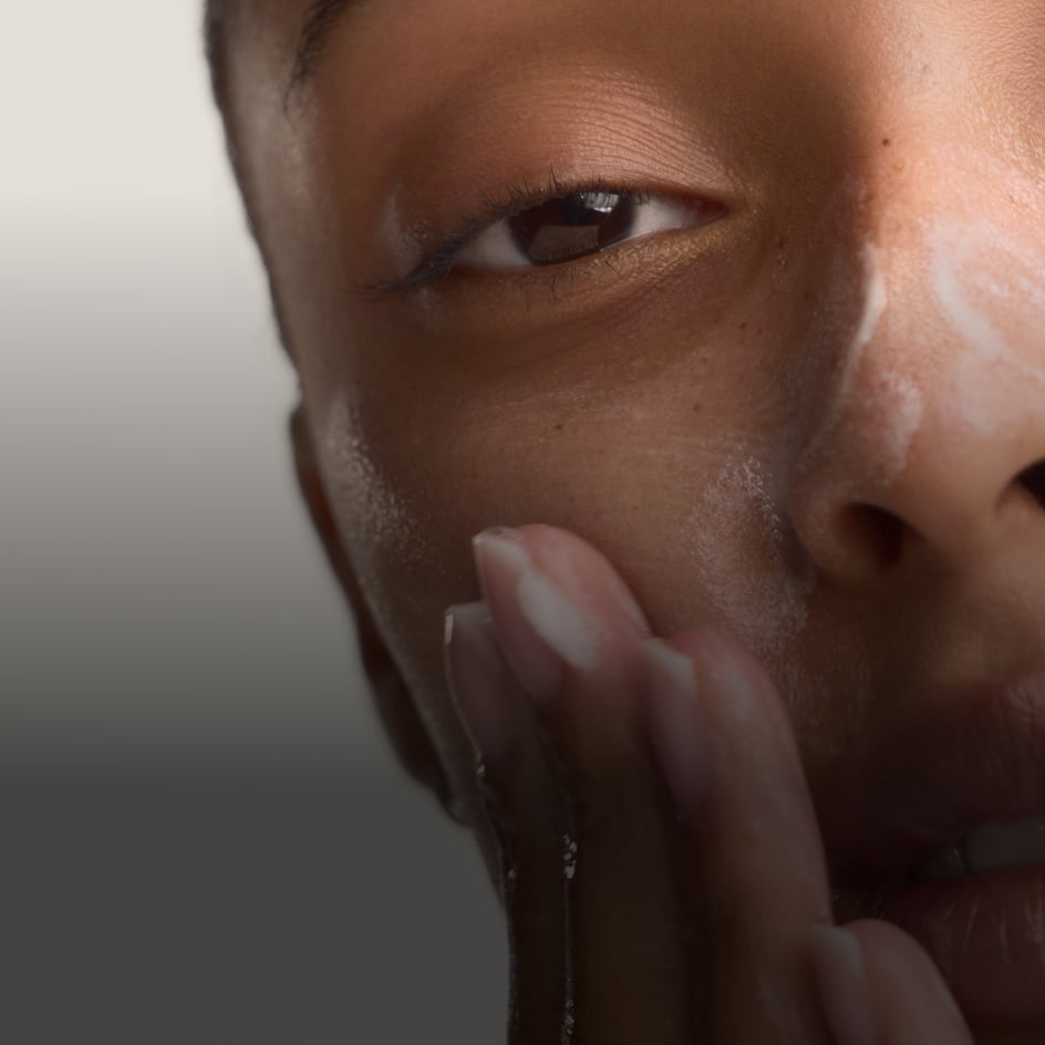 Hands assembling ZO Skin Health product components